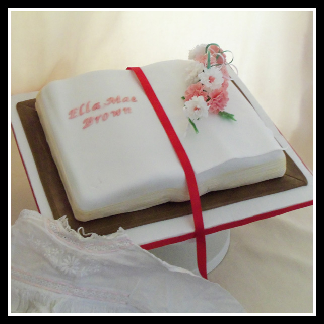 Open book cake with suger craft flowes