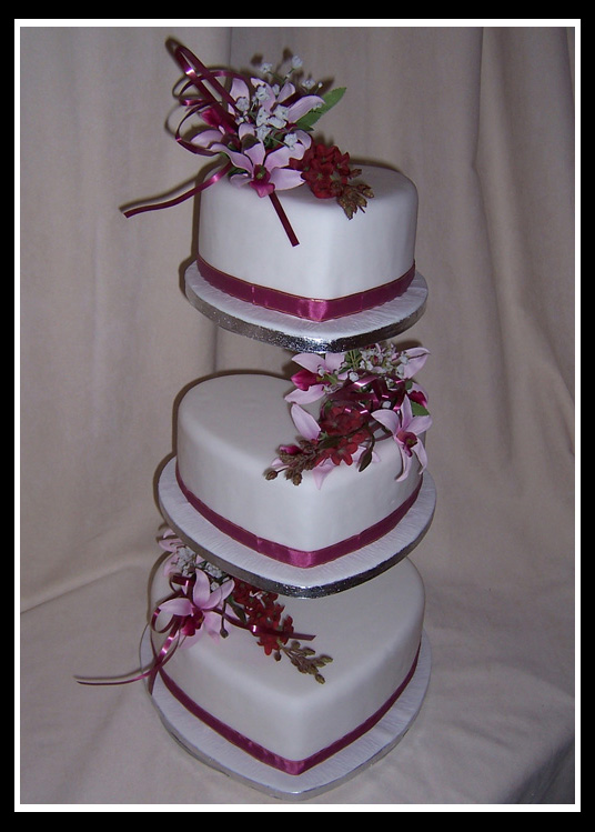 Three tier heart wedding cake