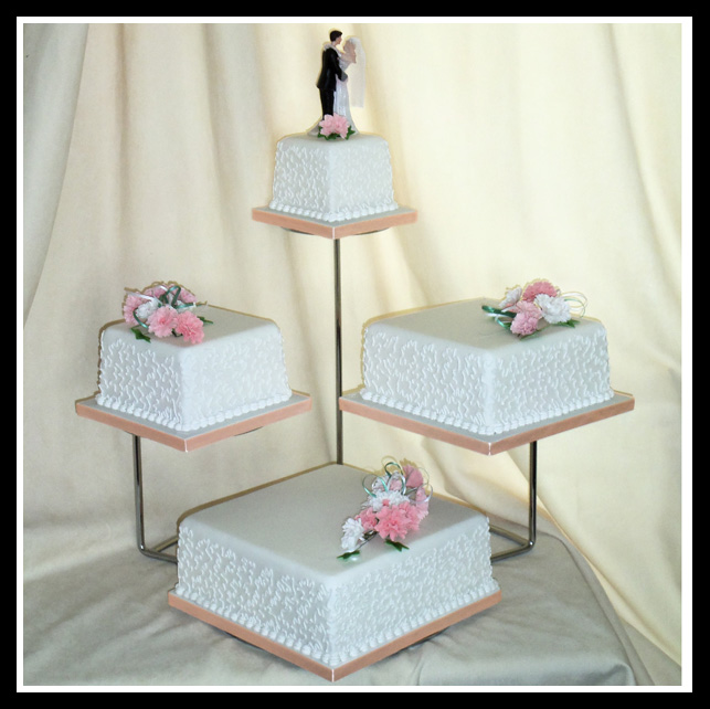 Four tier traditional square wedding cake