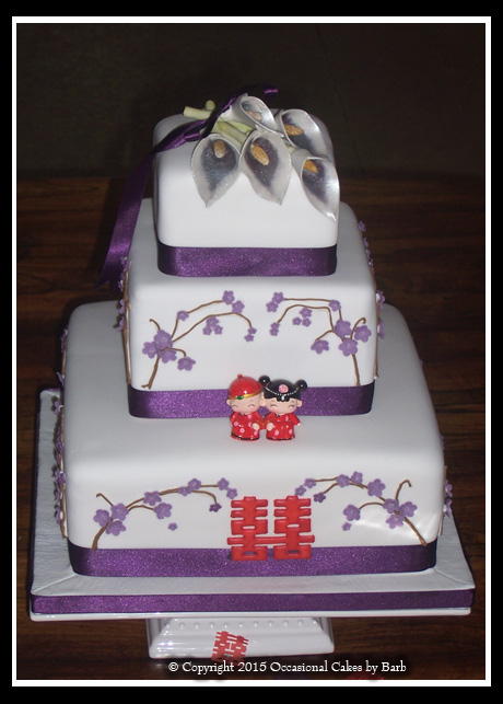 Three tier stacked Chinese themed wedding cake