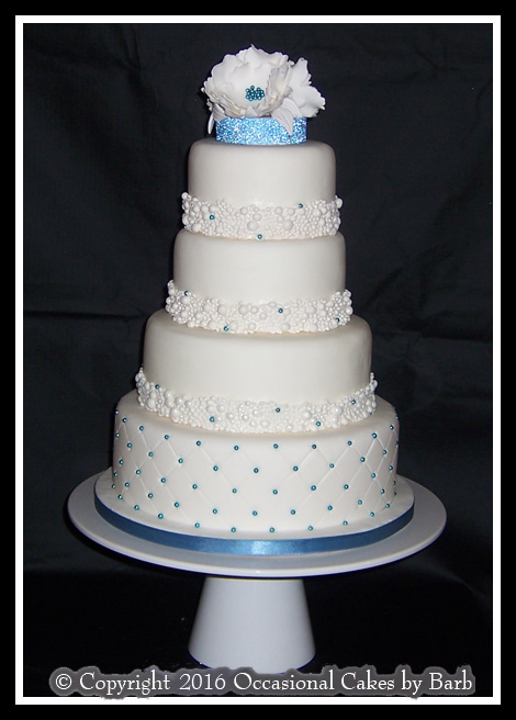 turquoise four tier wedding cake